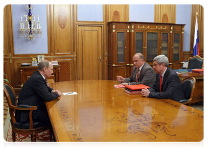 Prime Minister Vladimir Putin with Gennady Zyuganov, the leader of the Communist Party of the Russian Federation and of the Communist Party in the State Duma, and Ivan Melnikov, deputy chairman of the party