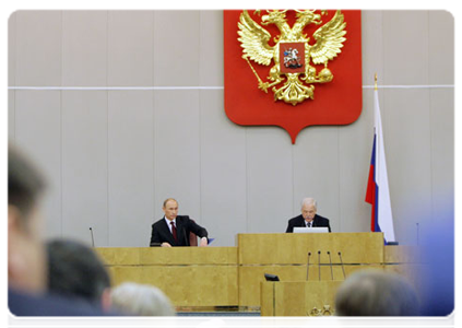 Prime Minister Vladimir Putin delivers a report on the government’s performance in 2010