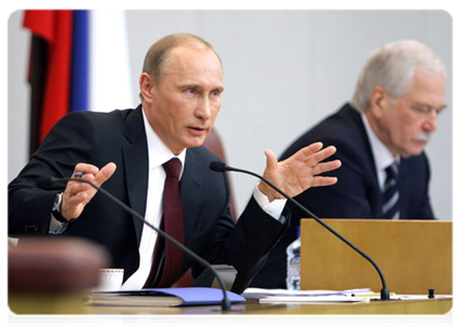 Prime Minister Vladimir Putin delivers a report on the government’s performance in 2010