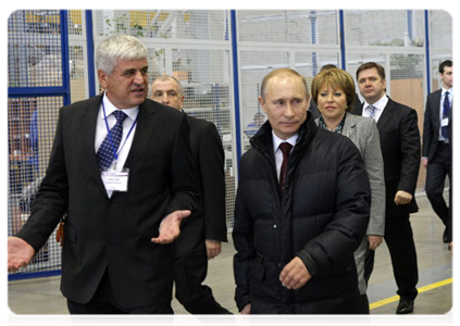 Prime Minister Vladimir Putin touring the Nevsky Plant