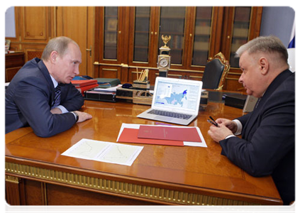 Prime Minister Vladimir Putin at a meeting with Konstantin Romodanovsky, director of the Federal Migration Service