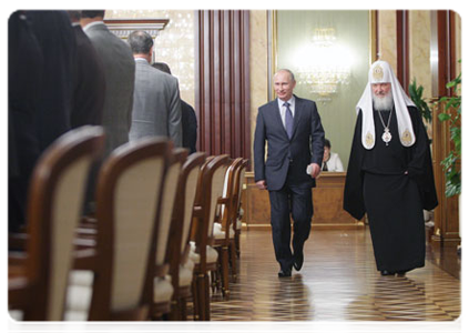 Prime Minister Vladimir Putin and Patriarch of Moscow and All Russia Kirill before the meeting of the Russian organising committee for the Day of Slavic Literature and Culture