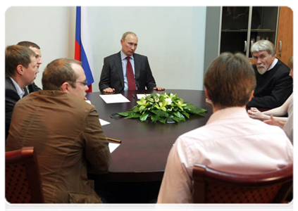 Prime Minister Vladimir Putin meets with the local United Russia chairman, local representatives of public organisations and local residents at a United Russia public reception office in Pskov