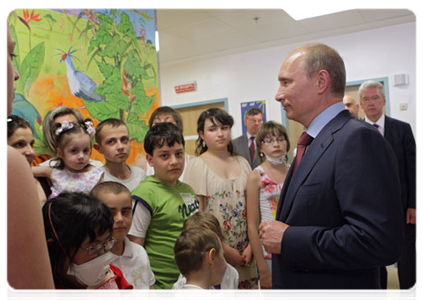 Prime Minister Vladimir Putin visiting the Federal Research and Clinical Centre for Children’s Hematology, Oncology and Immunology and talking to the young patients