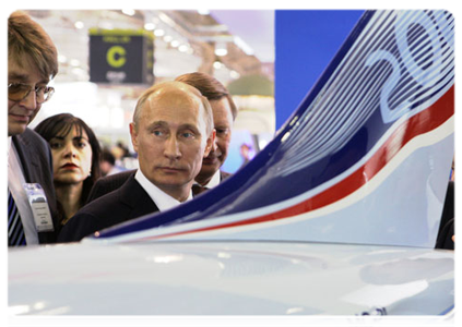 Prime Minister Vladimir Putin at the International Paris Air Show in the suburb of Le Bourget, where he observed the Russian Be-200 and Sukhoi Superjet 100 in flight