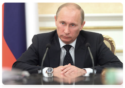 Prime Minister Vladimir Putin chairing a Government Presidium meeting
