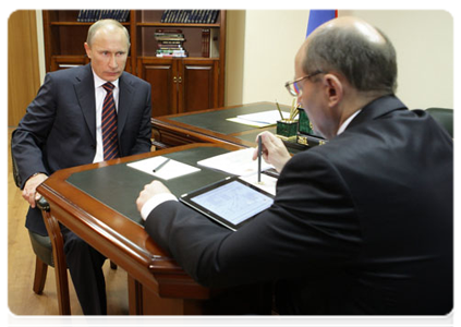 Prime Minister Vladimir Putin with Sverdlovsk Governor Alexander Misharin