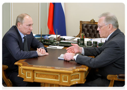 Prime Minister Vladimir Putin meets with President of the Russian Academy of Sciences Yuri Osipov