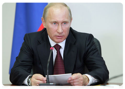 Prime Minister Vladimir Putin holding a meeting on the issue of defence procurement