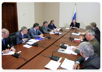 Prime Minister Vladimir Putin holding a meeting on the issue of defence procurement