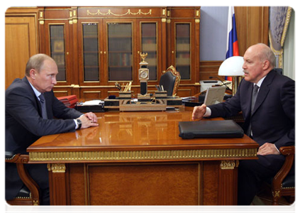 Prime Minister Vladimir Putin at a working meeting with Irkutsk Region Governor Dmitry Mezentsev