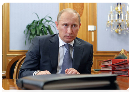 Prime Minister Vladimir Putin at a working meeting with Irkutsk Region Governor Dmitry Mezentsev
