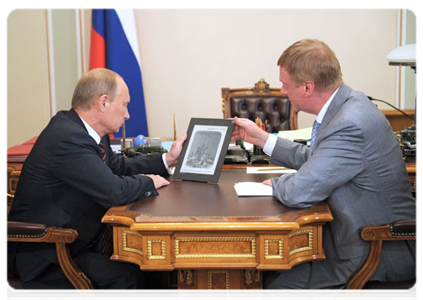 Prime Minister Vladimir Putin meeting with Rusnano CEO Anatoly Chubais