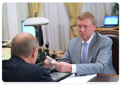Rusnano CEO Anatoly Chubais at a meeting with Prime Minister Vladimir Putin