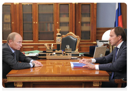 Prime Minister Vladimir Putin at a working meeting with the governor of the Krasnoyarsk Territory Lev Kuznetsov