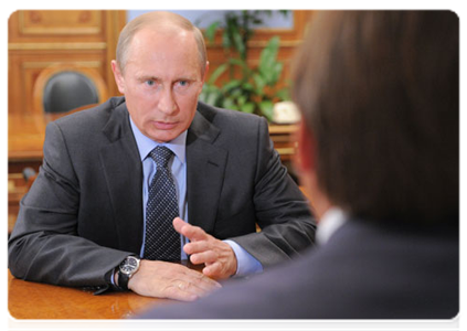 Prime Minister Vladimir Putin at a working meeting with the governor of the Krasnoyarsk Territory Lev Kuznetsov
