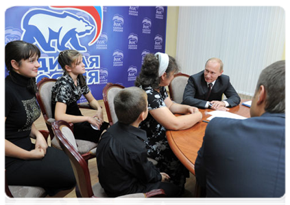 Prime Minister Vladimir Putin meeting with winners of the Popular Front primaries in the Smolensk Region and receiving members of the public at the community liaison office of the United Russia party chairman