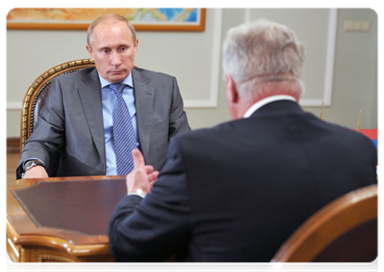 Prime Minister Vladimir Putin with Mikhail Shmakov, Chairman of the Federation of Independent Trade Unions of Russia