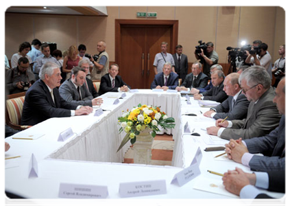 Prime Minister Vladimir Putin meeting with chief executives of ExxonMobil in Sochi
