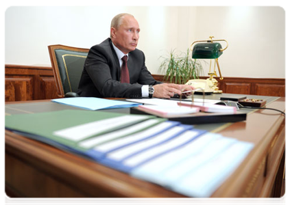 Prime Minister Vladimir Putin holding a videoconference on road building