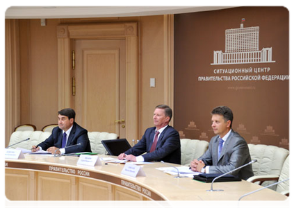 Minister of Transport Igor Levitin, Deputy Prime Minister Sergei Ivanov and Director of the Department of the Industry and Infrastructure of the Government of the Russian Federation Maxim Sokolov