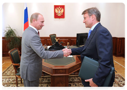 Prime Minister Vladimir Putin at  a meeting with Sberbank Chairman and CEO German Gref