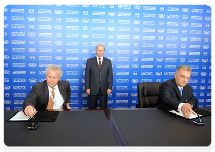Prime Minister Vladimir Putin attending the signing of several documents during the X International Investment Forum Sochi-2011