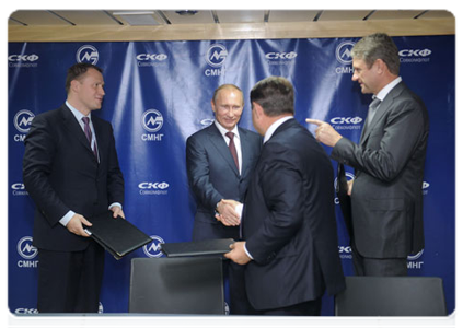 Following the official naming ceremony for the vessel, Vladimir Putin attended the signing of a series of documents