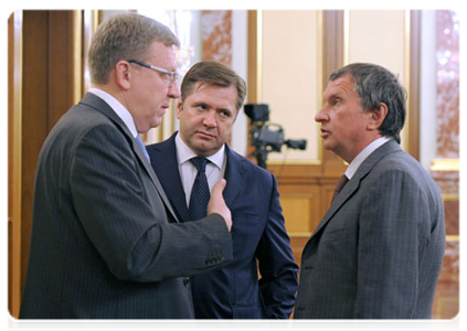 Deputy Prime Minister and Finance Minister Alexei Kudrin, Energy Minister Sergei Shmatko and Deputy Prime Minister Igor Sechin
