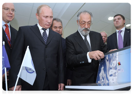 Prime Minister Vladimir Putin visiting an exhibition of the Russian Geographical Society devoted to the Arctic and the International Arctic Forum during his trip to Arkhangelsk