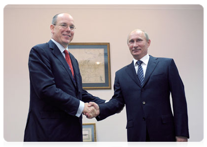 Prime Minister Vladimir Putin with ruling Prince Albert II of Monaco at the International Arctic Forum in Archangelsk