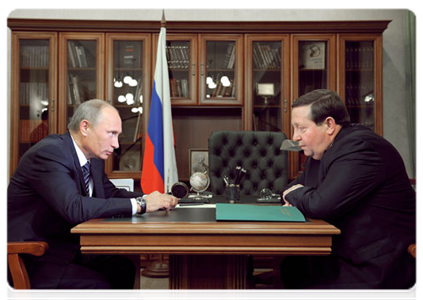 Prime Minister Vladimir Putin at a working meeting with the governor of the Arkhangelsk Region Ilya Mikhalchuk