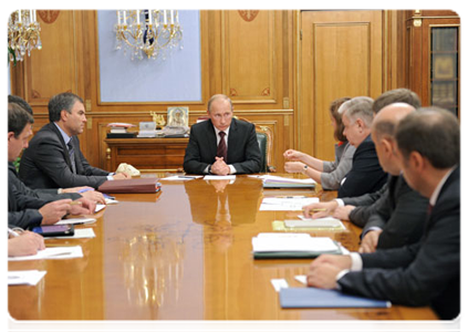 Prime Minister Vladimir Putin chairs at a conference on the provision of state services for the public