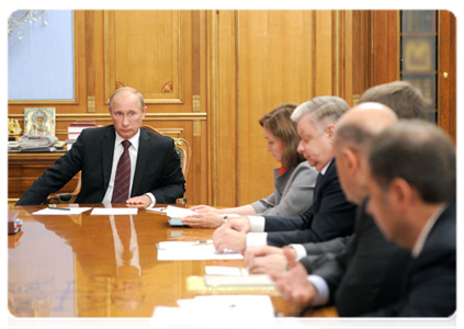 Prime Minister Vladimir Putin chairs at a conference on the provision of state services for the public