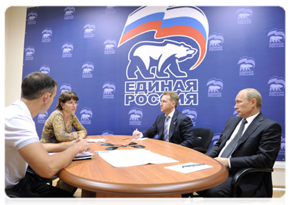 Prime Minister Vladimir Putin receiving people at the public reception room of the United Russia chairman in Vladivostok. The reception was attended by First Deputy Prime Minister Igor Shuvalov