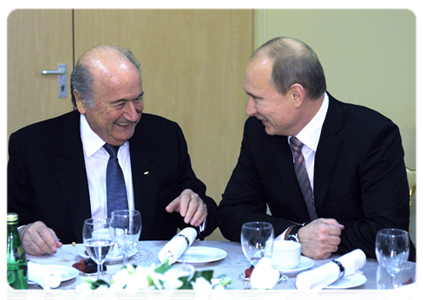 Prime Minister Vladimir Putin at a meeting with president of FIFA Joseph Blatter and head of UEFA Michel Platini