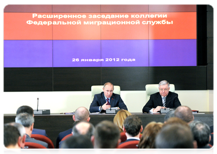 Prime Minister Vladimir Putin at an expanded meeting of the Board of the Federal Migration Service