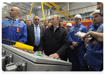 Prime Minister Vladimir Putin visits the Tikhvin train carriage factory to attend the launch ceremony for serial production