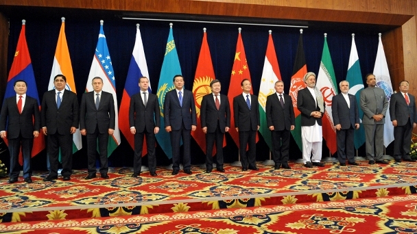 Participants pose for a group photo at the meeting of the SCO Council of Heads of Government