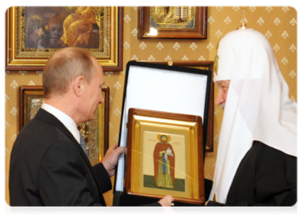 Prime Minister Vladimir Putin visiting St Daniel Monastery to congratulate Patriarch Kirill of Moscow and All Russia on the third anniversary of his enthronement
