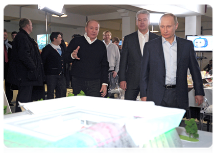 Prime Minister Vladimir Putin visits the construction site of Moscow Youth Centre KVN Planet