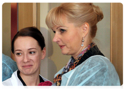Minister of Healthcare and Social Development Tatyana Golikova and Stage and screen actress, Merited Artist of Russia, Chulpan Khamatova, a co-founder of the Gift of Life charity foundation