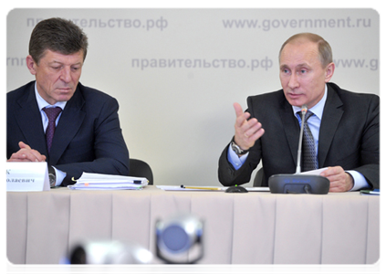 Prime Minister Vladimir Putin and Deputy Prime Minister Dmitry Kozak at a video conference meeting on the development of training centres for Russian national teams