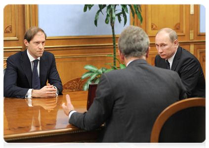 Prime Minister Vladimir Putin during a meeting with Viktor Khristenko and Denis Manturov