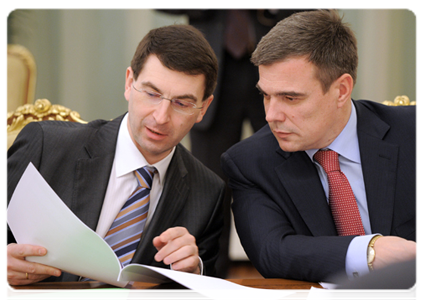 Communications Minister Igor Shchegolev and Deputy Minister of Economic Development Oleg Savelyev at a meeting of the Government Presidium