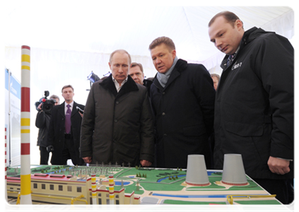 Prime Minister Vladimir Putin finds out more about OGK-2 (the Unified Generating Company) which owns the electric power plant and inspected the stands and the gas turbine unit
