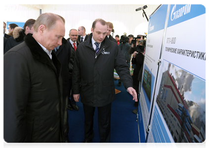 Prime Minister Vladimir Putin finds out more about OGK-2 (the Unified Generating Company) which owns the electric power plant and inspected the stands and the gas turbine unit