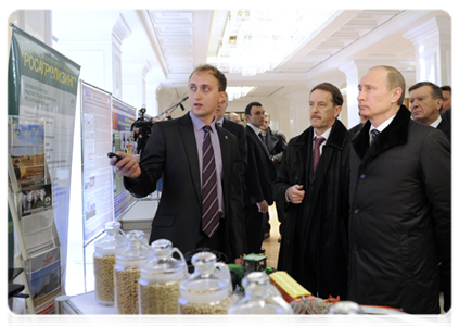 Prime Minister Vladimir Putin visiting the exhibition of agricultural produce