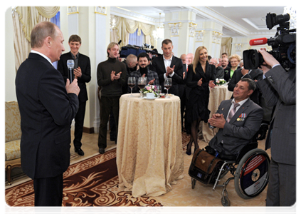 Prime Minister Vladimir Putin meets with those who supported him most actively during the presidential election campaign