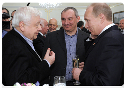 Vladimir Putin, Artistic Director and Director of the Moscow Art Theatre named after Chekhov Oleg Tabakov and musician and actor, director of the engineering department of the Marussia Formula-1 team Nikolai Fomenko